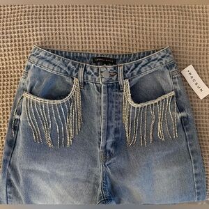 Kendall and Kylie western rhinestone fringe jeans.